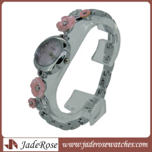 Montre à quartz pour femme avec bracelet de fleur de charme